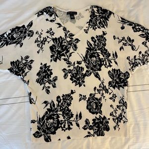 Black and white floral sweater.